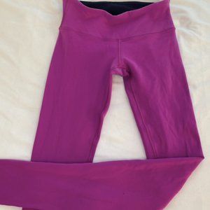 Lululemon thermal leggings in pink/black, size 4
